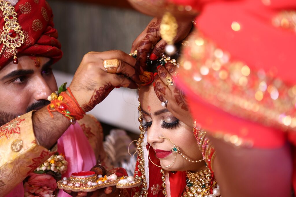 man-putting-sindoor-marriages-in-india-entertainments-saga