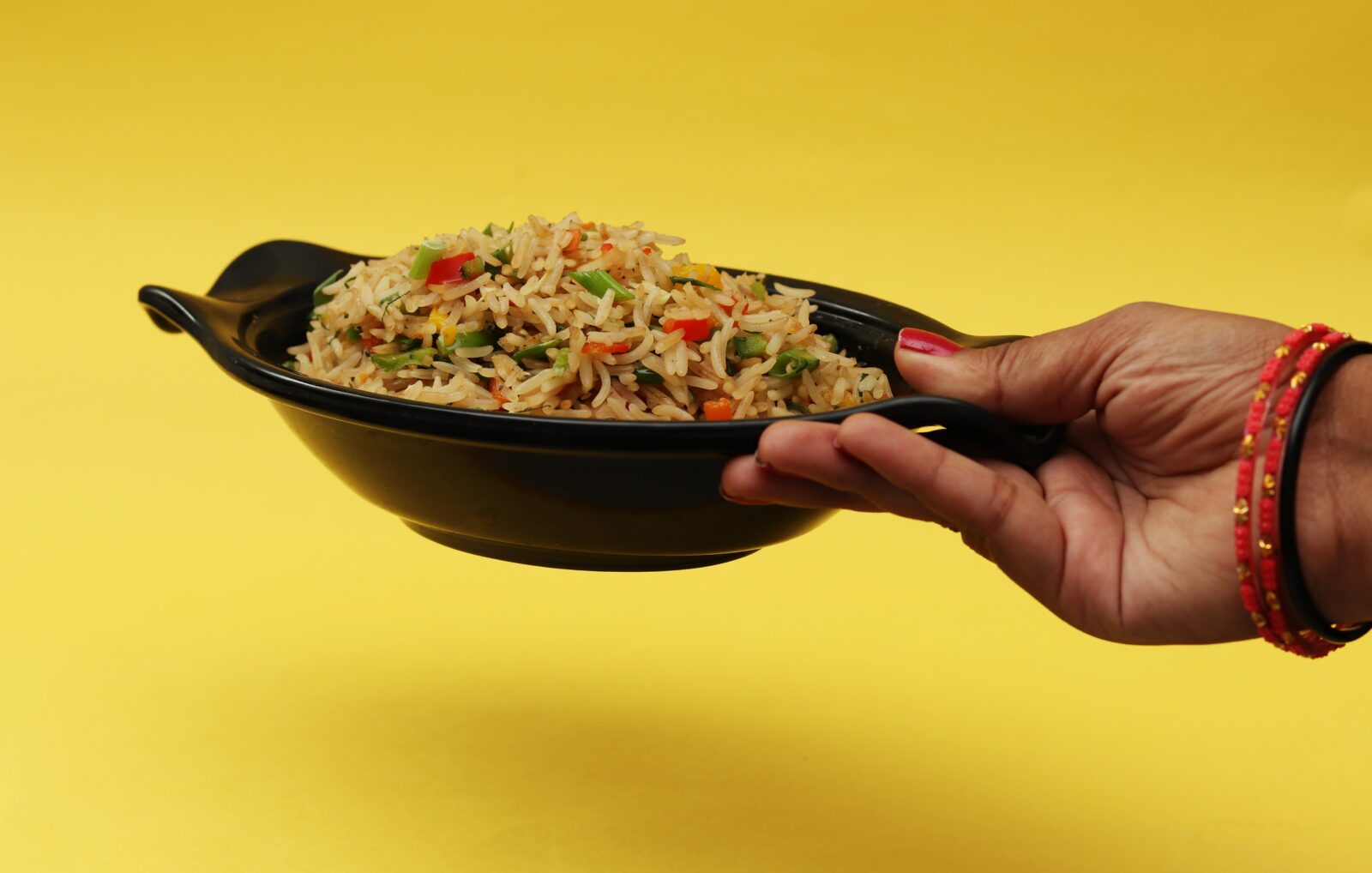 indian-woman-holding-bowl-of-rice-food-trends-2020-online-food-blog-entertertainments-saga